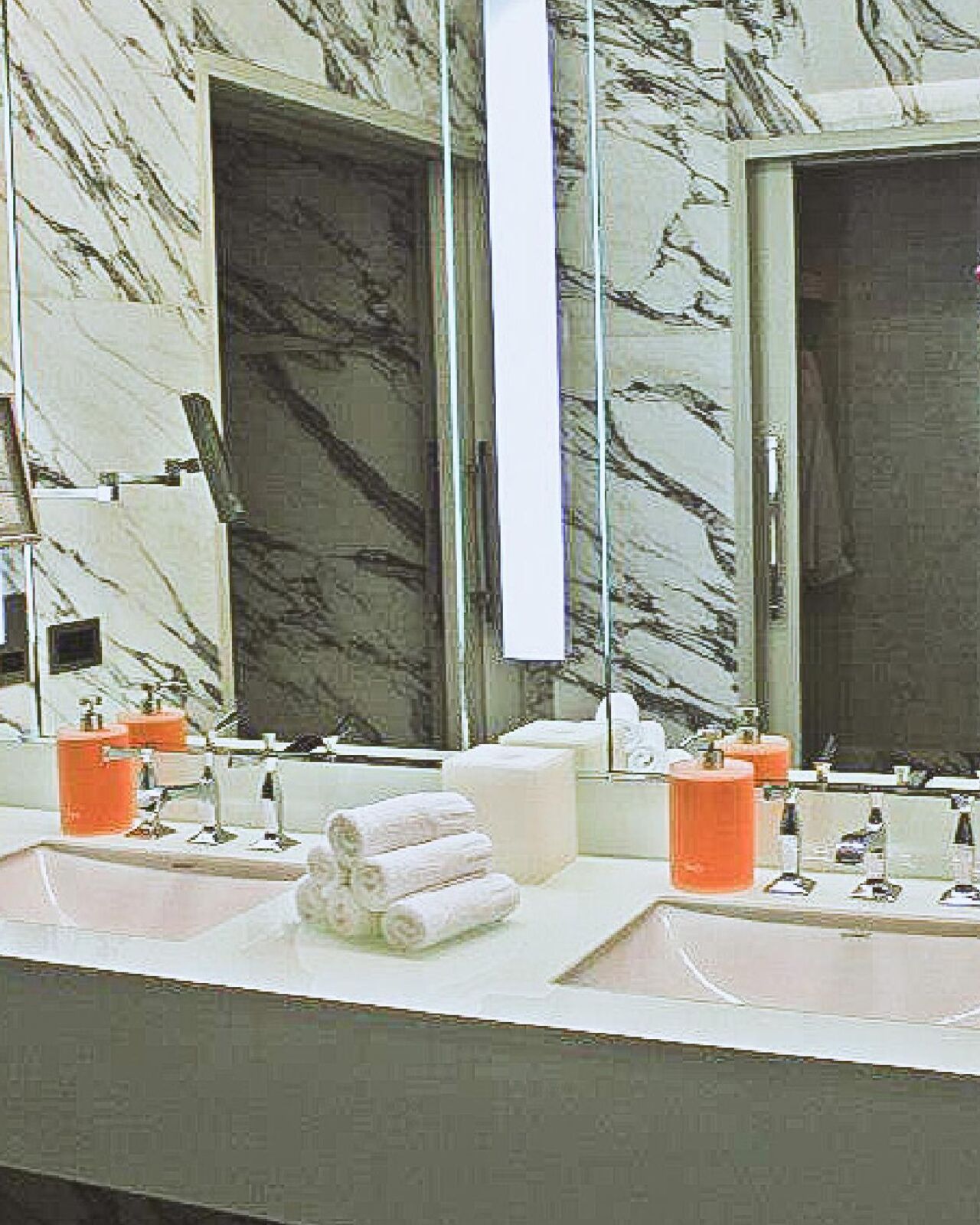 Marble bathroom detail with premium brassware